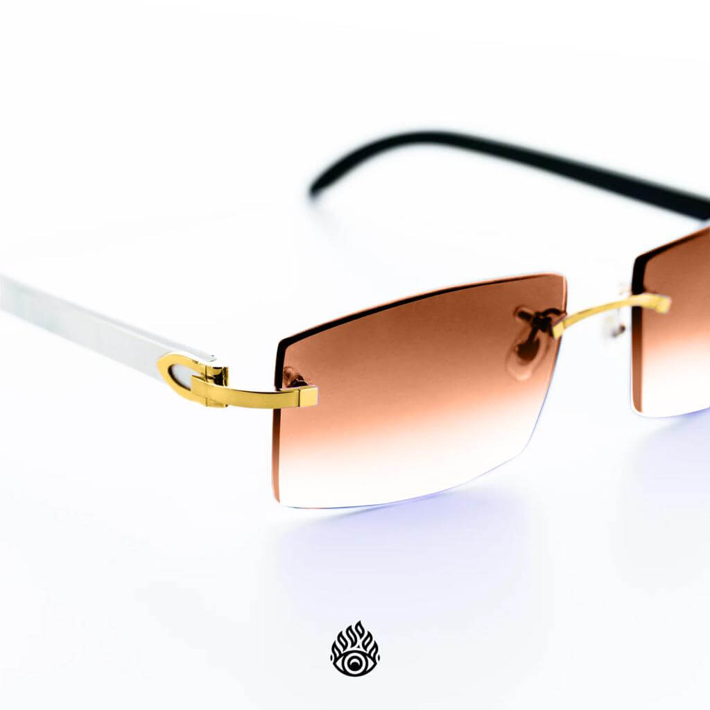 Cartier White Horns with Gold Detail